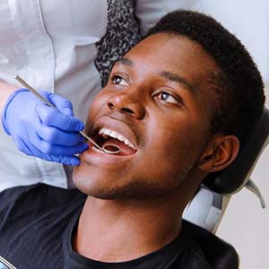 Man visiting his Houston dentist for a dental checkup