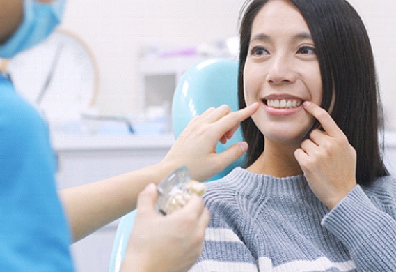Woman at cosmetic dentistry consultation.